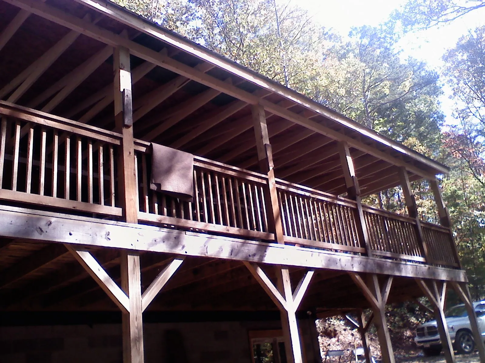 Timber framing under a new elevated porch and deck — Roof Leak Repair in Yamhill by Roofing Brothers